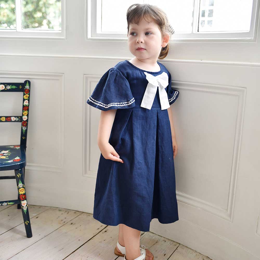 navy blue dress with white bow Sun-imperial