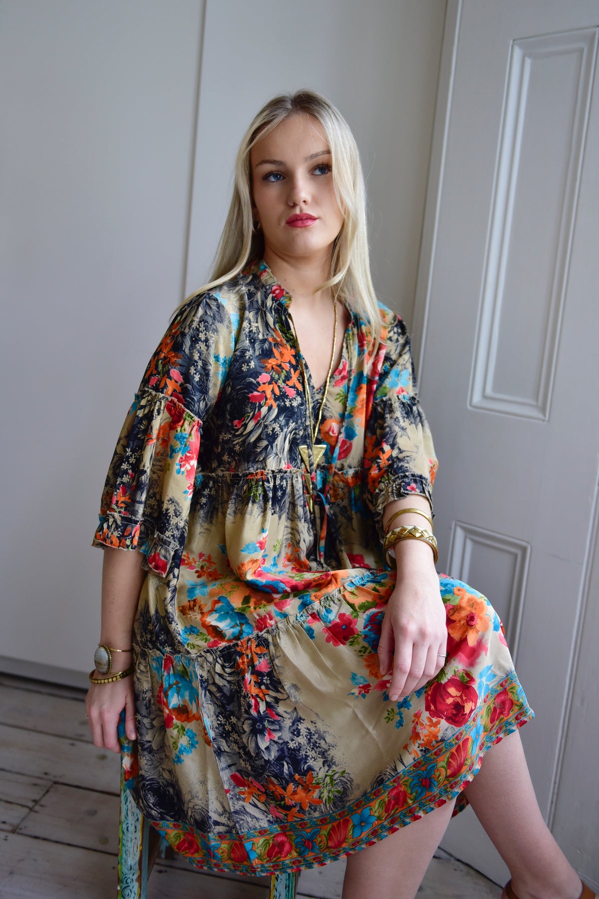 Cari, Colourful Floral Print Viscose Short Tiered Dress With 3/4 Length Sleeves