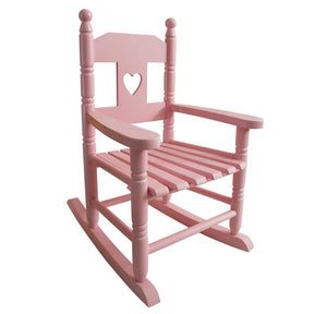 child's pink wooden rocking chair with cut out heart side view