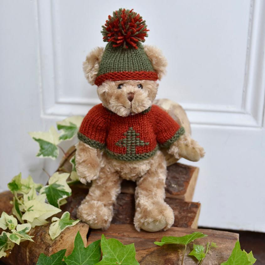 Teddy Wearing Red And Green Hand Knitted Jumper And Cosy Knitted Hat