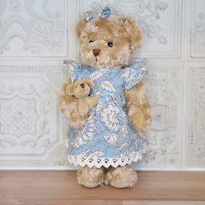 Teddy Bear With Cornflower Blue Print Dress And Baby