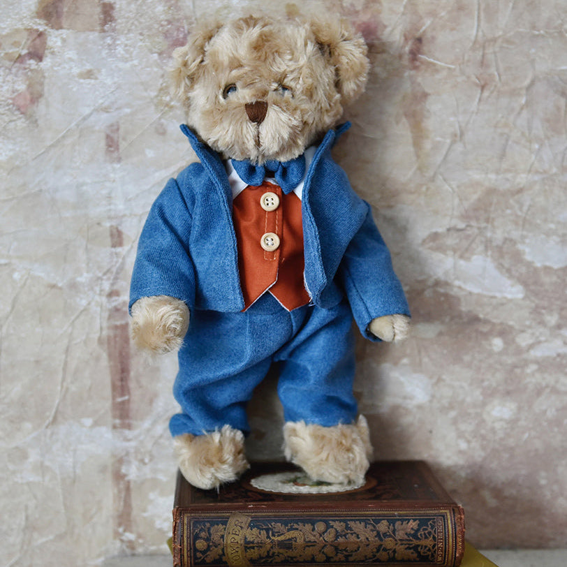 Teddy Wearing A Blue Suit & Red Waistcoat