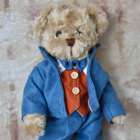 Teddy Wearing A Blue Suit & Red Waistcoat