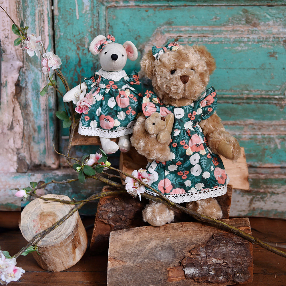 Group shot of teddy bear with green woodland dress and soft toy mouse in matching dress