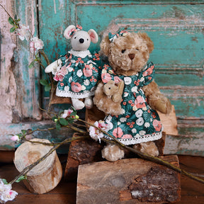 Group shot of teddy bear with green woodland dress and soft toy mouse in matching dress